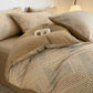 Close up of brushed cotton weave texture on the bedding set