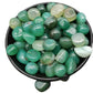 Colour enhanced blue agate decorative pebbles in a loose display lot