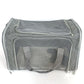 Grey pet carrier from above showing the zipped mesh roof window and the mesh front panel