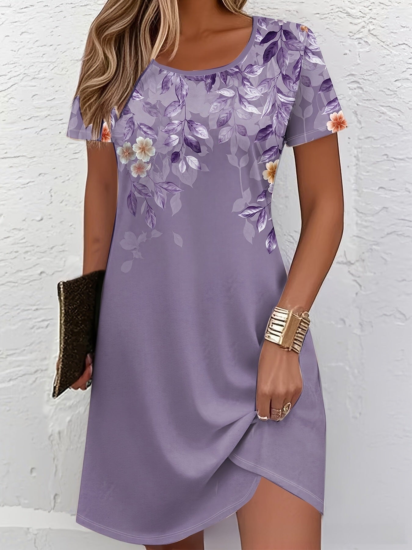 Close view of the digital floral print across the shoulder of a short sleeve dress