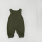 Knit baby dungarees styled for everyday wear with the bib straps visible