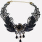 Lace choker necklace with an alloy filigree centre and small dangling beads