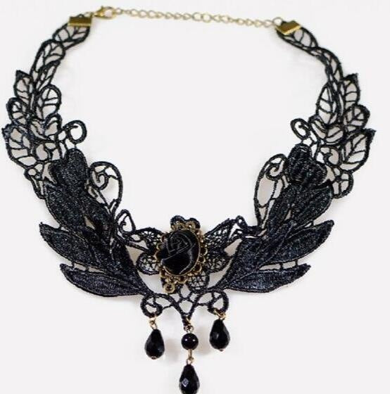 Lace choker necklace with an alloy filigree centre and small dangling beads