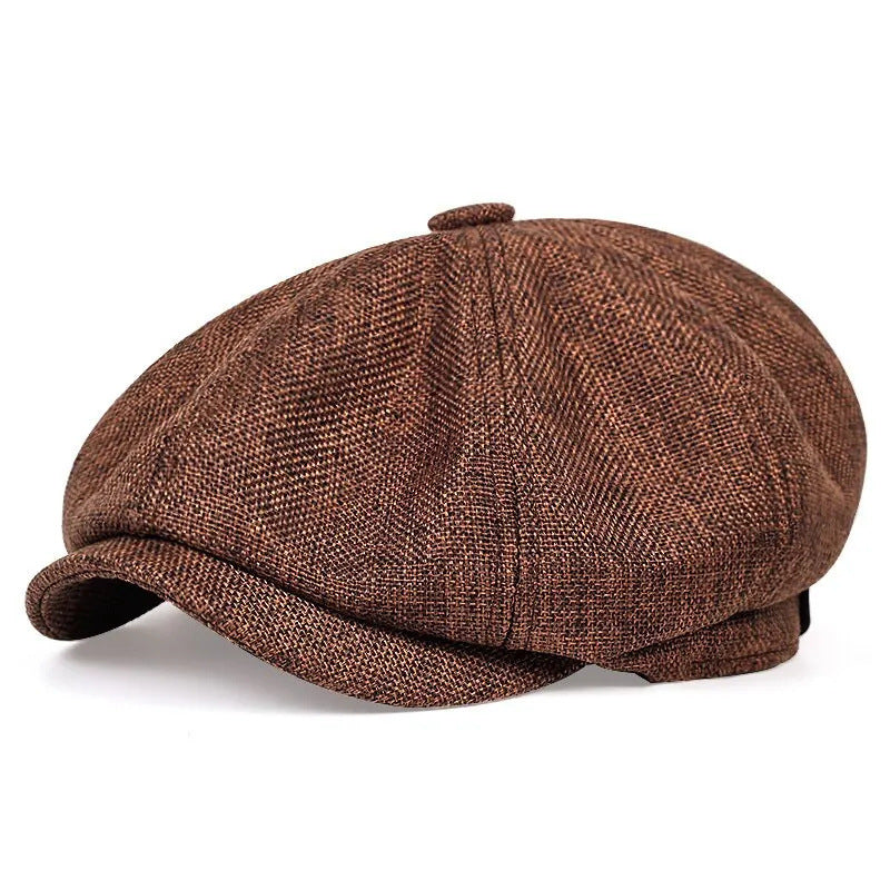Newsboy gatsby cap with a rounded crown and linen look woven texture shown from the side