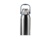 Hot tea steaming from the open mouth of the thermos at a kitchen sink