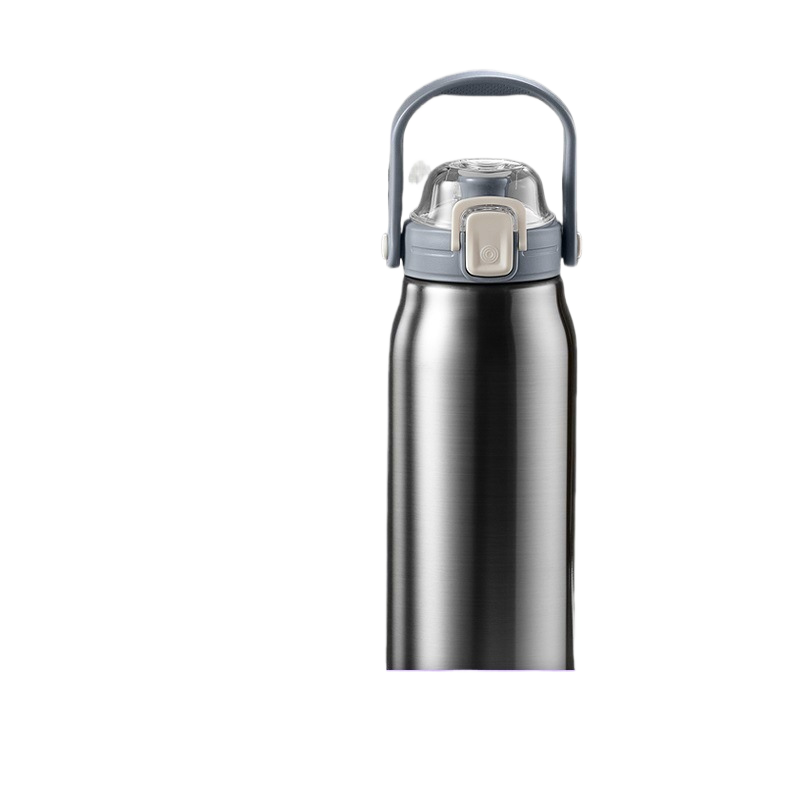 Hot tea steaming from the open mouth of the thermos at a kitchen sink