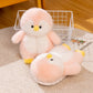 Pink plush penguin toy and a pink penguin slipper beside a wire basket on a round rug, Pink Full-Heel EU 36-37