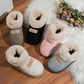 Fur lined bootie slipper on a chunky nonslip EVA platform sole for indoor wear