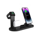 Black four in one charging stand with phone, watch and earbuds and a USB cable at the base