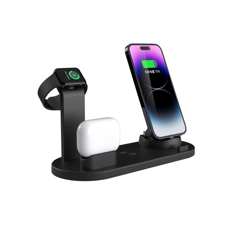 Black four in one charging stand with phone, watch and earbuds and a USB cable at the base