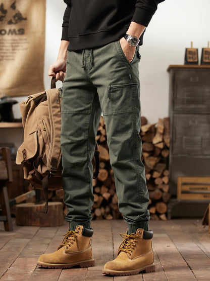 Men's American retro cargo pants in deep khaki, front view showing thigh pockets