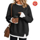 Navy women's sweatshirt showing the split hem and contrast white rib detail