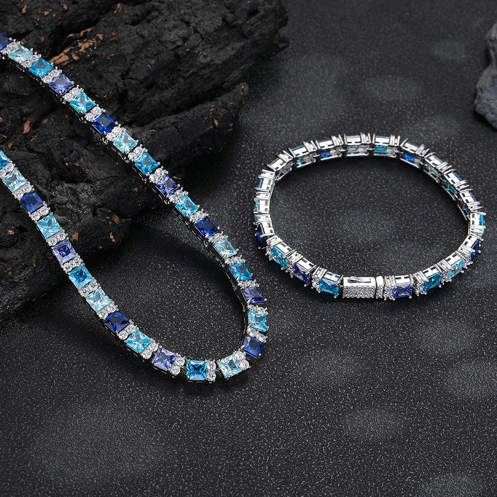 Close up of zircon stones set in a continuous platinum tone row