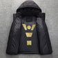Open black puffer jacket from behind showing the black lining and a gold printed pictogram on the inner back panel