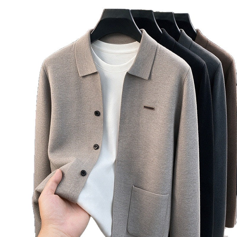 Taupe knit men's cardigan with turn-down collar and patch pocket on a hanger, white background