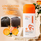 White shampoo bottle with orange cap standing on a soft background beside a fresh rose stem