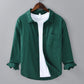 Side view of the mens linen blend long sleeve shirt on a hanger
