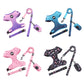 Four colourways of the dog harness and leash set laid out, purple, blue, floral black and pink