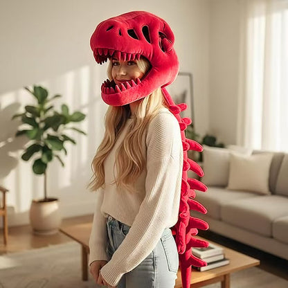 Woman wearing a red plush dinosaur skeleton head mask with a long red spine down her back