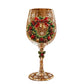Stemmed Christmas wine goblet showing the gold spiral and holly berry stem accent