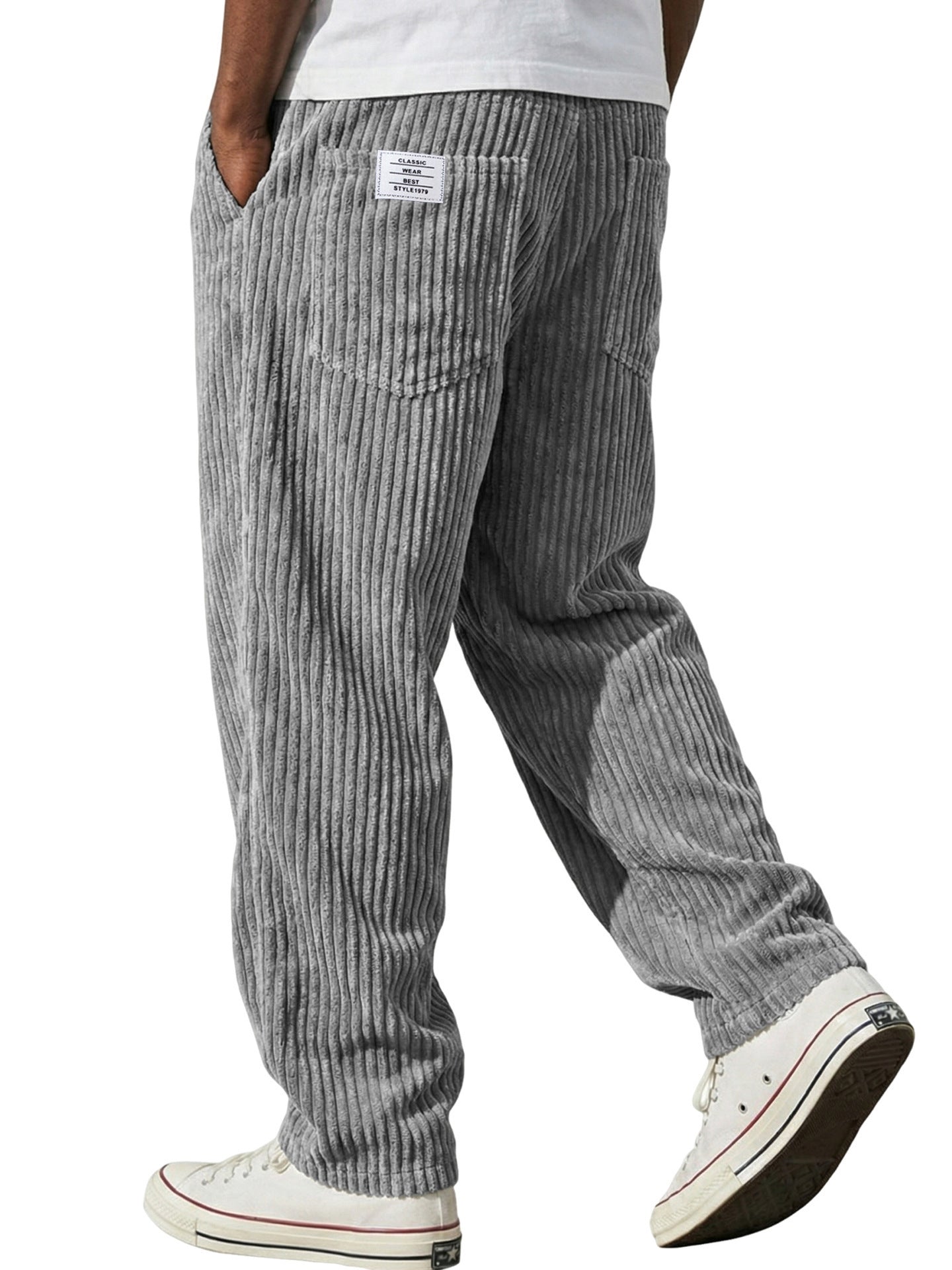 Loose straight wide wale corduroy trousers shown full length on a standing model