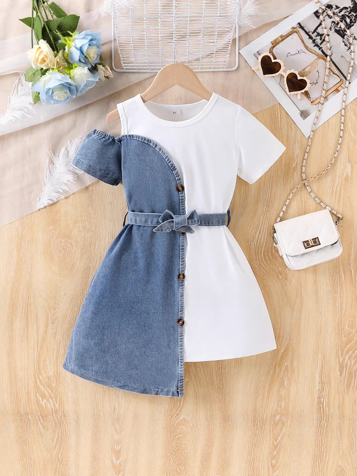 Girls' patchwork denim dress worn for a family outing day