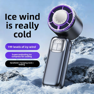 Handheld folding fan with a metal cold plate and purple blades shown on a snowy background