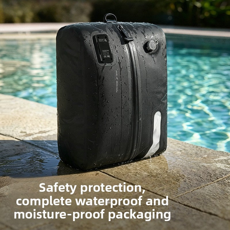 Black vacuum compression bag standing at a pool edge with water beads on its surface and a window strip