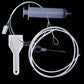 Unclogging set with a syringe, white tube, brush wire loop, scraper and plug pin on a black background