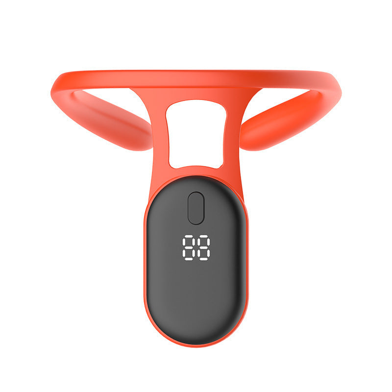 Bright orange silicone posture trainer collar with digital display pod on a white background