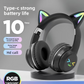 Black cat ear headphones on a stand seen from the side with lit ear tips