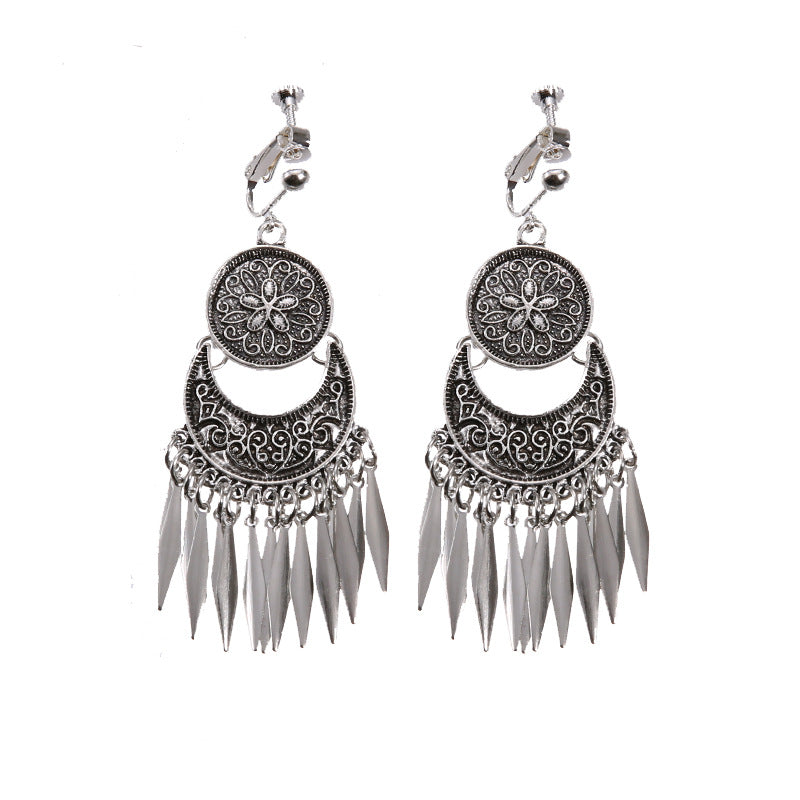 Vintage boho tassel clip-on earrings for non pierced ears, zinc alloy drop pair photographed on white background