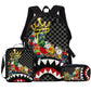 Checker print school backpack with a gold crown, cartoon collage and shark mouth, with matching lunch bag and pencil case