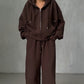 Brown zip-up hoodie and wide leg trousers set worn by a woman, option photo for size L