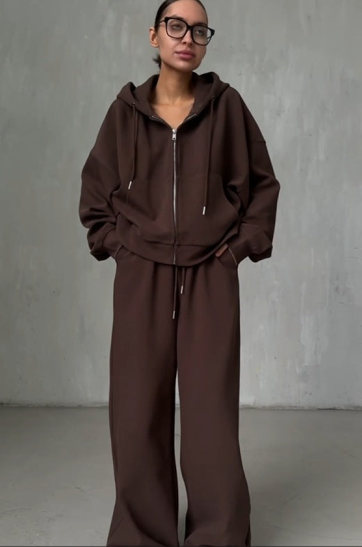 Brown zip-up hoodie and wide leg trousers set worn by a woman, option photo for size L