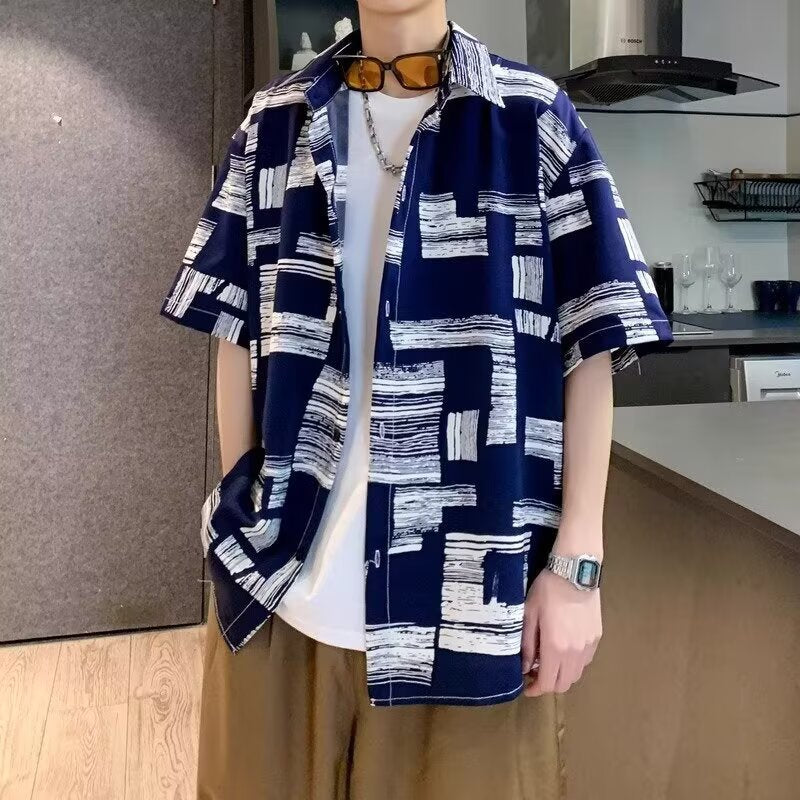 Navy colourway of the abstract print shirt, dropped shoulder and elbow length sleeve
