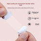 Fingers peeling a transparent PET double-sided clothing tape strip away from its white paper backing