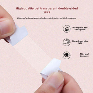 Fingers peeling a transparent PET double-sided clothing tape strip away from its white paper backing