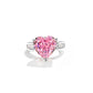 Pink heart simulated diamond ring with clear baguette stones channel set into both shoulders