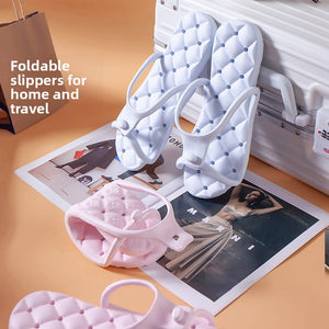 Foldable EVA travel slipper with a quilted cushioned footbed shown in a studio product photo