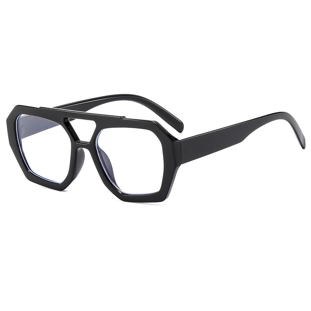 Retro polygonal sunglasses set out in a daily carry setup