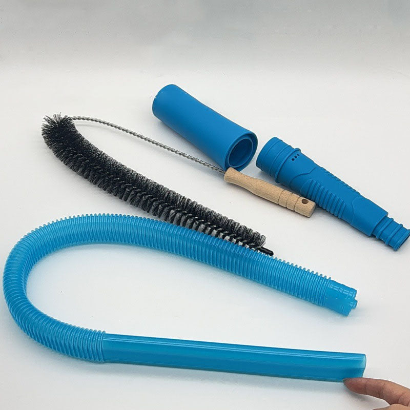 Flat lay of the kit, a flexible bristle brush, a blue flexible hose, and two blue vacuum adapters