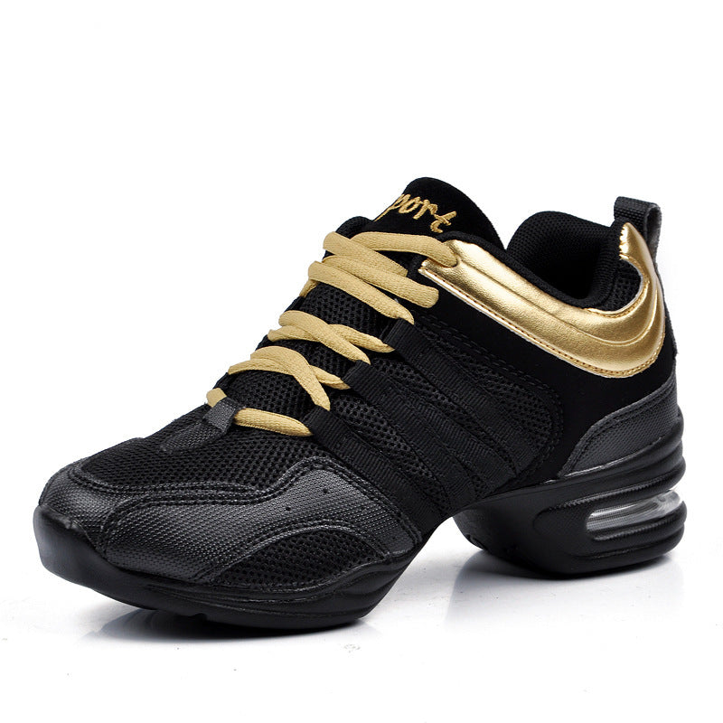 Black gold mesh dance sneaker with gold laces and Sport lettering, side view with heel air cushion