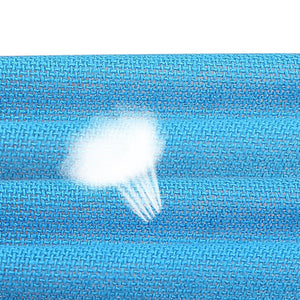 Macro of the blue woven tape surface with a water droplet resting on the weave