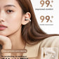 Model wearing a champagne open ear clip earphone on the outer ear, seen in profile
