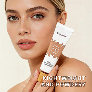 Model holding the white BB blur tinted moisturizer tube with wood-look cap beside her bare, even complexion