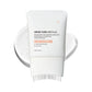 Scalp care hair essence tube with comb applicator on a bathroom shelf
