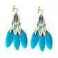 Handmade bohemian clip-on earrings with tassel and bead drop detail, zinc alloy frame, studio shot on white background