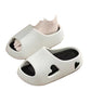 Black cushioned EVA slide sandals with pink footbed viewed from the side