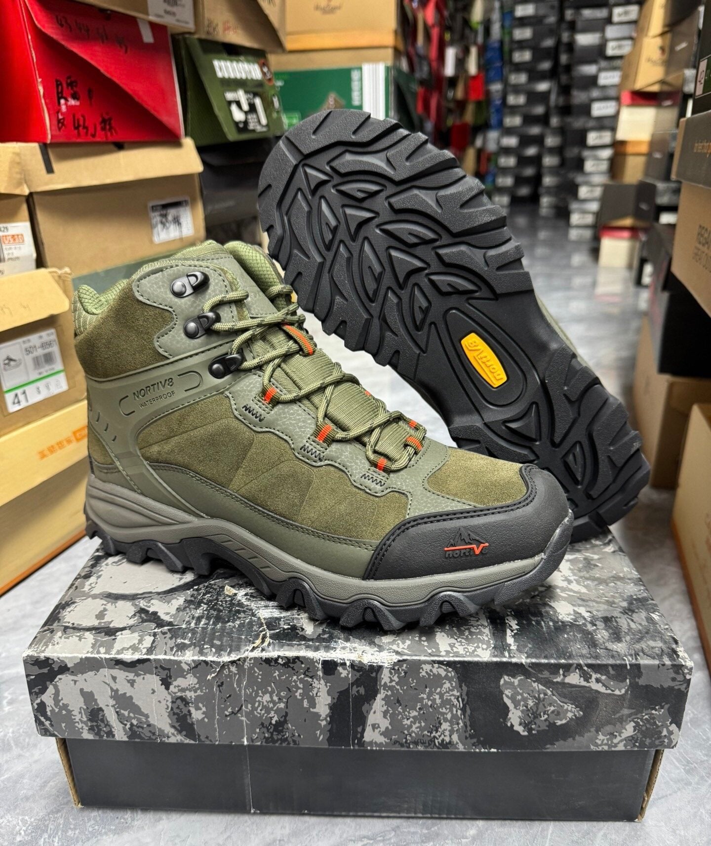 Close view of the YKK side zipper on the men's hiking boot
